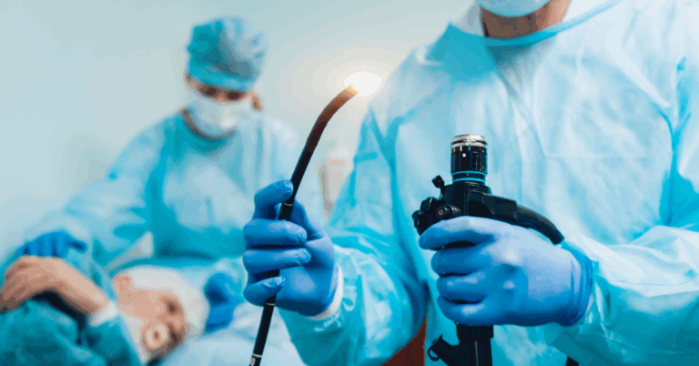 Doctor holding an endoscope before performing an ESG procedure to help achieve weight loss results.